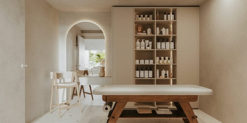 a room with a table, shelves, and chairs in it